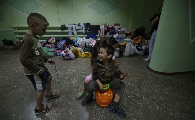 беженцы со Славянска, Иловайск / REUTERS