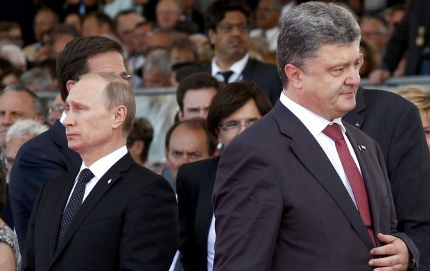 Poroshenko and Putin discuss measures on de-escalation of situation in east of Ukraine/REUTERS