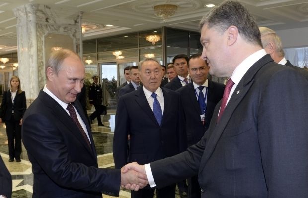 Владимир Путин и Петр Порошенко / REUTERS