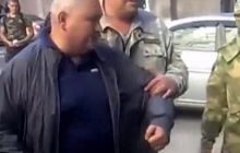 В Запорожье лидера "казачества" бросили в мусорный бак (видео)