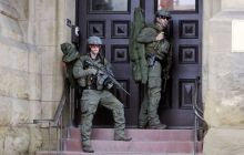 Suspect in killing of Canadian memorial sentry confirmed dead
