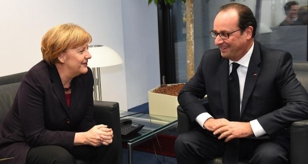 Ангела Меркель та Франсуа Олланд / REUTERS