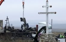 Nine bodies from MH17 crash remain unidentified