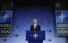 NATO foreign ministers tell Russia to 'get its tanks out of Ukraine'