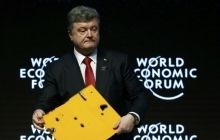 Порошенко привіз до Давосу фрагмент автобуса, розстріляного під Волновахою (фото)