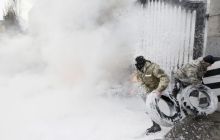 Учасники акції біля Міноборони загасили шини (фоторепортаж)