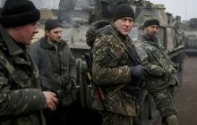 Украинские военные не могут отвести тяжелое вооружение из-за постоянных обстрелов боевиков