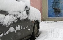 Из-за снегопада в Москве парализовано движение на дорогах