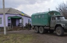 Москаль поднял украинский флаг над селом из "серой зоны" (фоторепортаж)