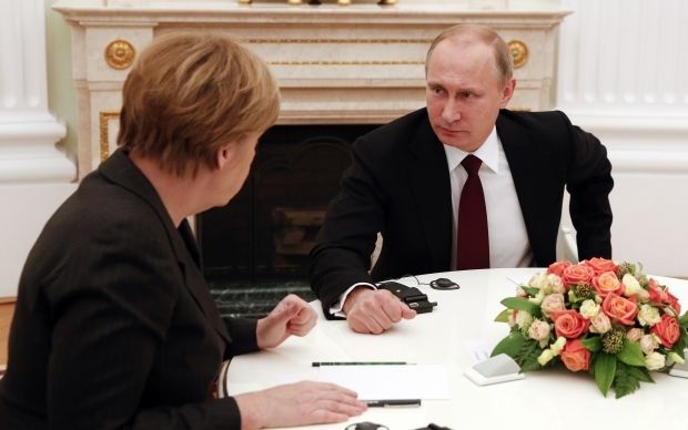 Ангела Меркель и Владимир Путин / REUTERS