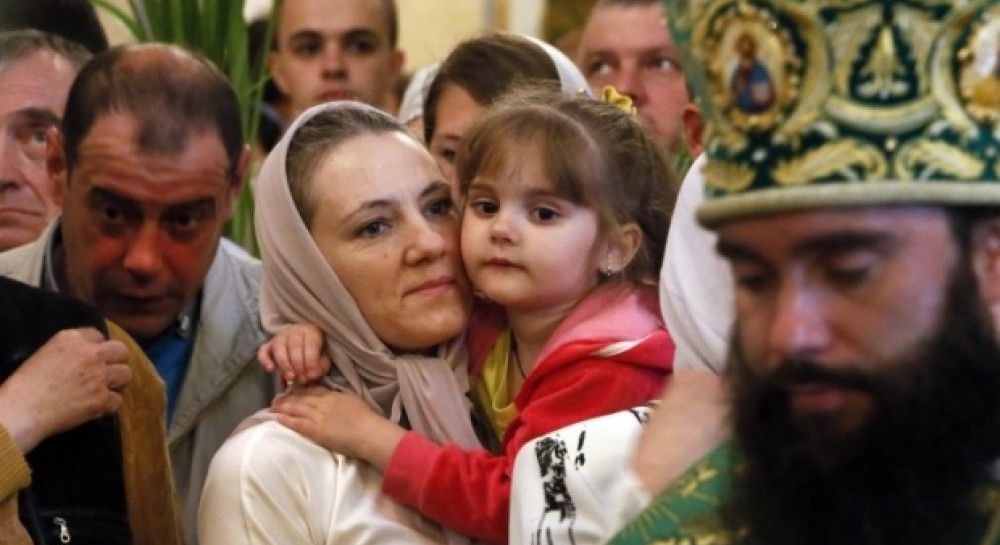 Свято Трійці у Києво-Печерській лаврі: за богослужінням сугубо молилися за мир в Україні (фоторепортаж)