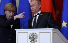 Merkel in Moscow describes annexation of Ukraine's Crimea as "criminal"