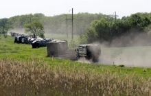 Reuters takes photos of Russian military vehicles moving to Ukraine border