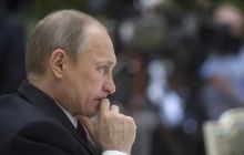 Putin signs law to ban "undesirable" NGOs in Russia