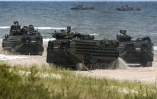 Dutch Foreign Minister says NATO drills in Poland meant as warning to Putin