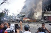 Indonesia military plane crashes into houses