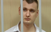На засіданні суду один з екс-"беркутівців"прикріпив до одягу нашивку з російським прапором