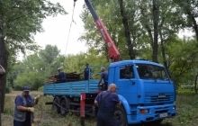 На Трухановом острове коммунальщики начали сносить незаконные постройки (фото)