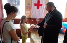 У Мелітополі віруючі зібрали шкільне приладдя для дітей переселенців