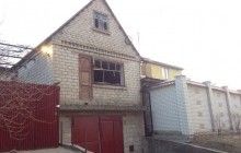СМИ: В центре Запорожья в окно жилого дома выстрелили из гранатомета (фото)