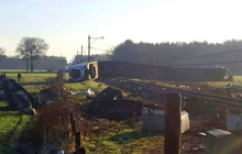 Dutch train derails after hitting hydraulic crane