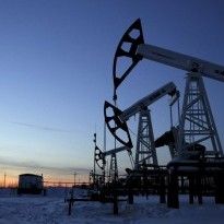 Reuters: Oil edges up as U.S. crude stocks fall, but soaring output weighs