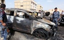 ISIS claims responsibility for double car bomb attack with at least 32 deaths in Iraq