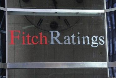 Fitch признает дефолтом выплаты России по долларовым облигациям в рублях