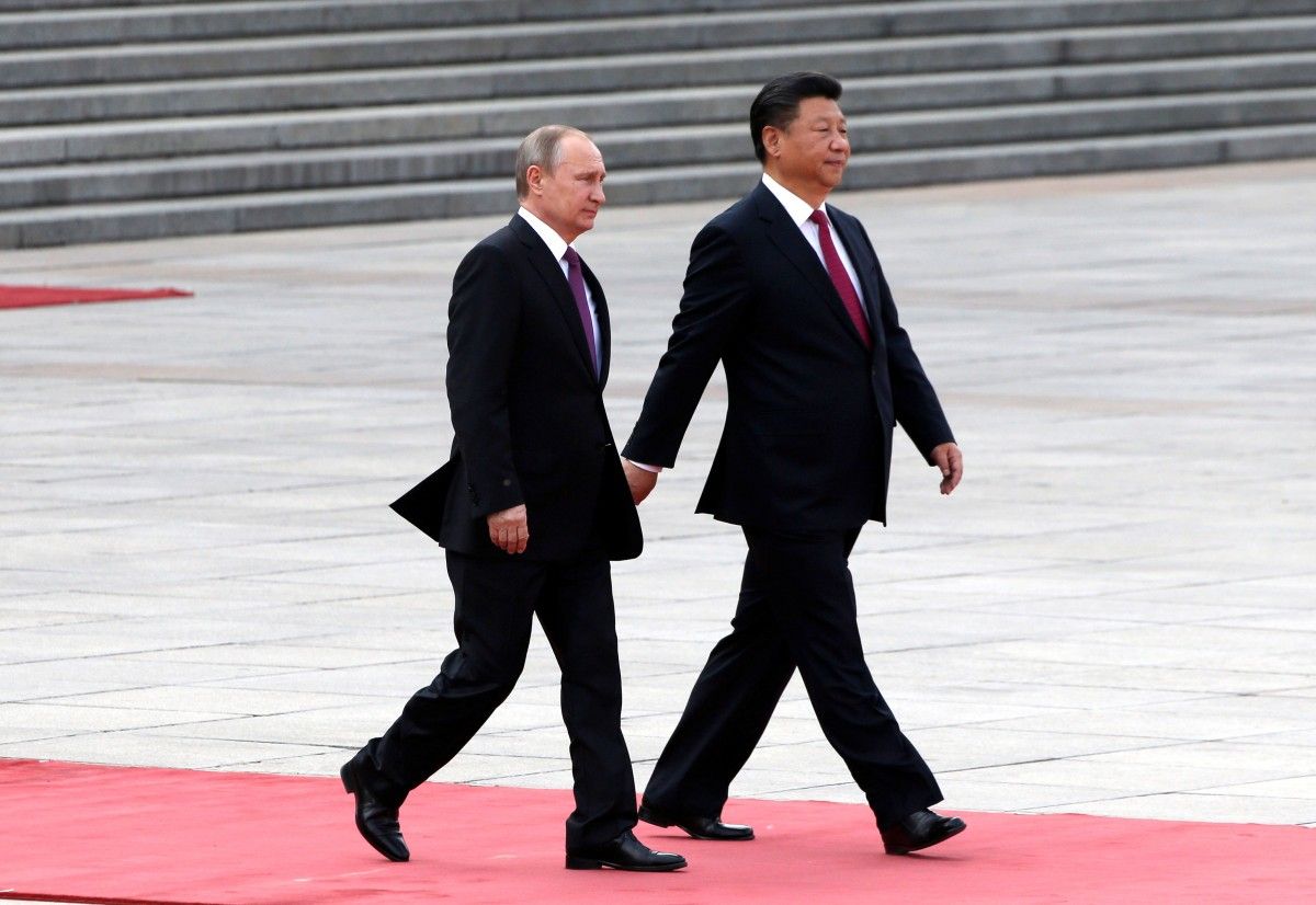 Недавние шаги Путина грозят значительно усложнить жизнь Си / фото REUTERS Недавние шаги Путина грозят значительно усложнить жизнь Си / фото REUTERS
