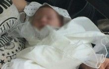 На Київщині затримали 25-річну переселенку, що намагалась продати власне немовля (фото)