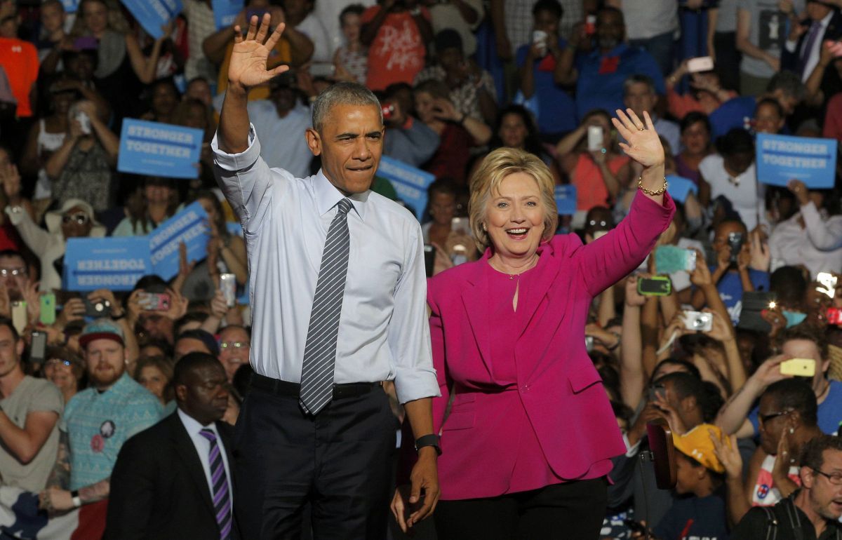 Барак Обама и Хиллари Клинтон / REUTERS