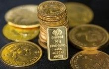 Золото дешевеет на фоне заявлений главы Федрезерва США