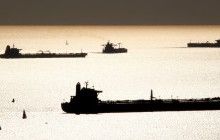 Reuters: Oil prices rise on weaker dollar, but U.S. output drags