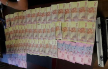 На Харківщині викрили майора поліції, яка за хабарі видавала дозволи на носіння зброї