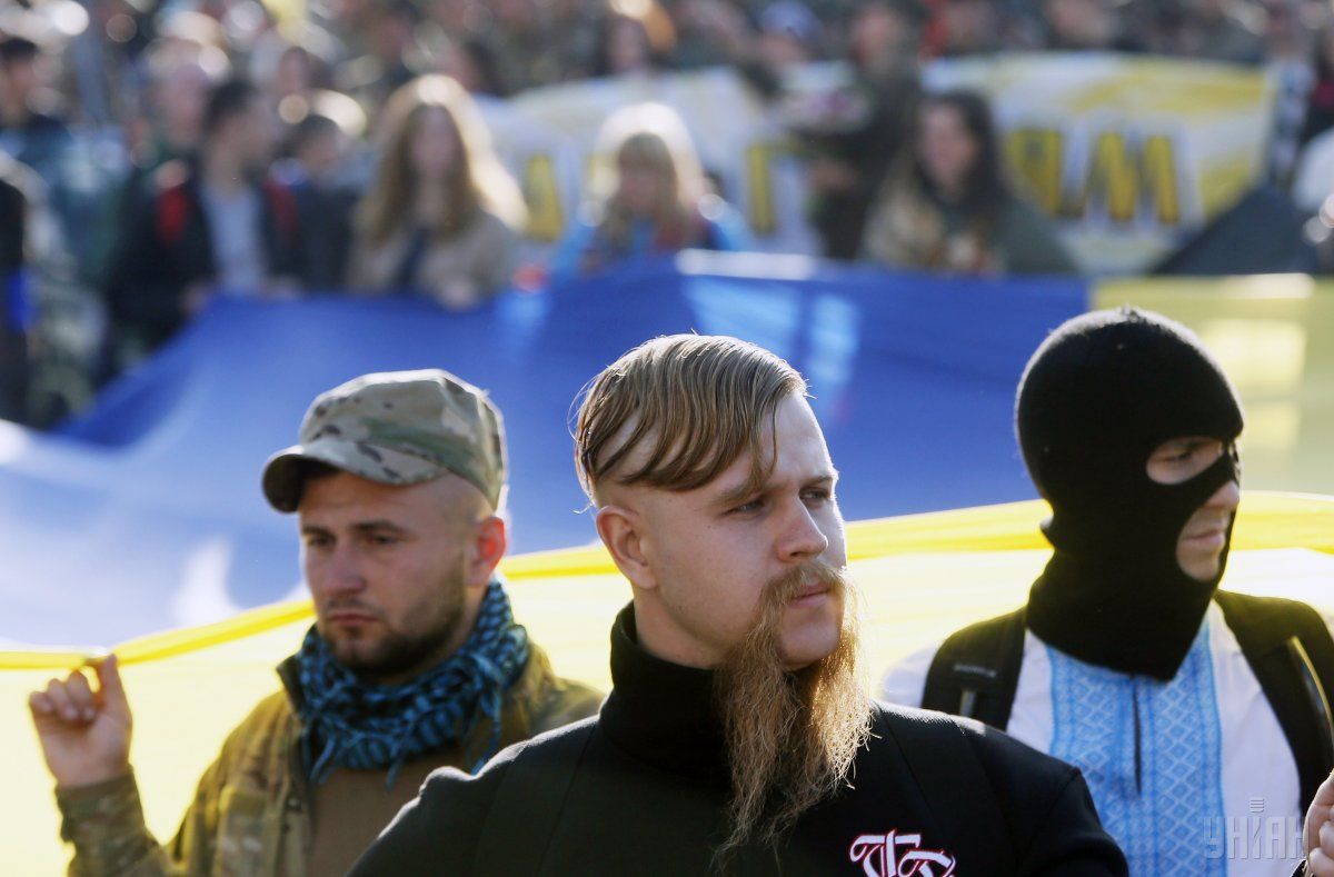 Учасники Маршу слави героїв УПА в Києві з нагоди свята Покрови 14 жовтня 2014 року / Фото УНІАН Учасники Маршу слави героїв УПА в Києві з нагоди свята Покрови 14 жовтня 2014 року / Фото УНІАН