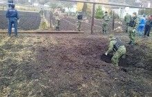 "Привіти" 122-м калібром: штаб АТО показав наслідки ворожого обстрілу села під Маріуполем (фото)