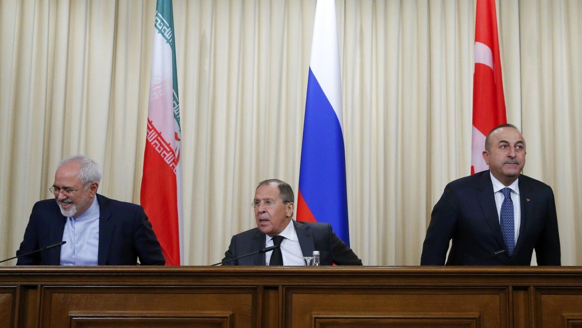 Главы МИД Ирана, России и Турции / REUTERS Главы МИД Ирана, России и Турции / REUTERS