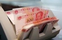 Китай укрепил курс юаня к доллару до максимума за полтора года
