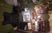На Харьковщине у экс-чиновника обнаружили арсенал оружия и российскую военную форму (фото, видео)