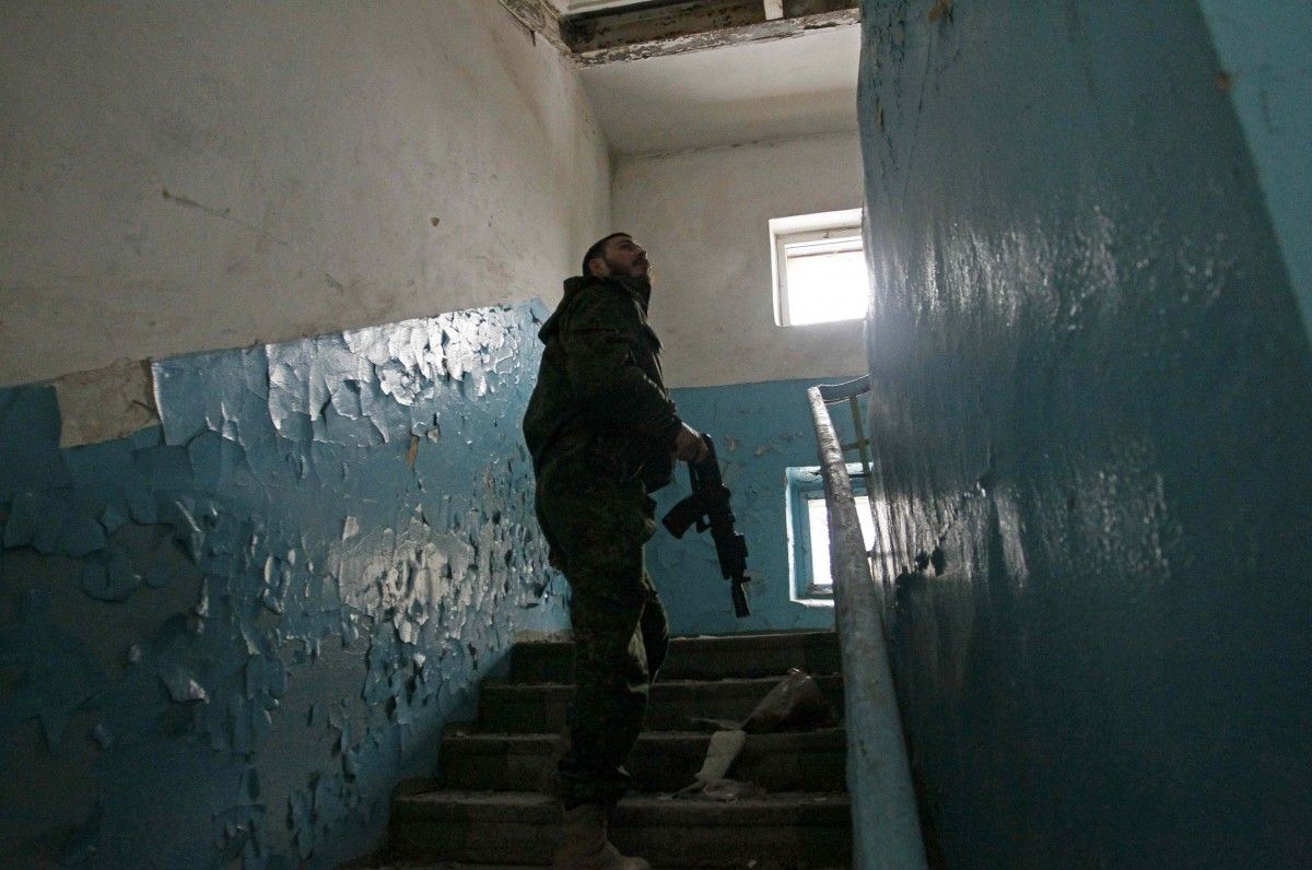 Рашисти тероризують місцеве наслеение Мелітополя / фото REUTERS Рашисти тероризують місцеве наслеение Мелітополя / фото REUTERS