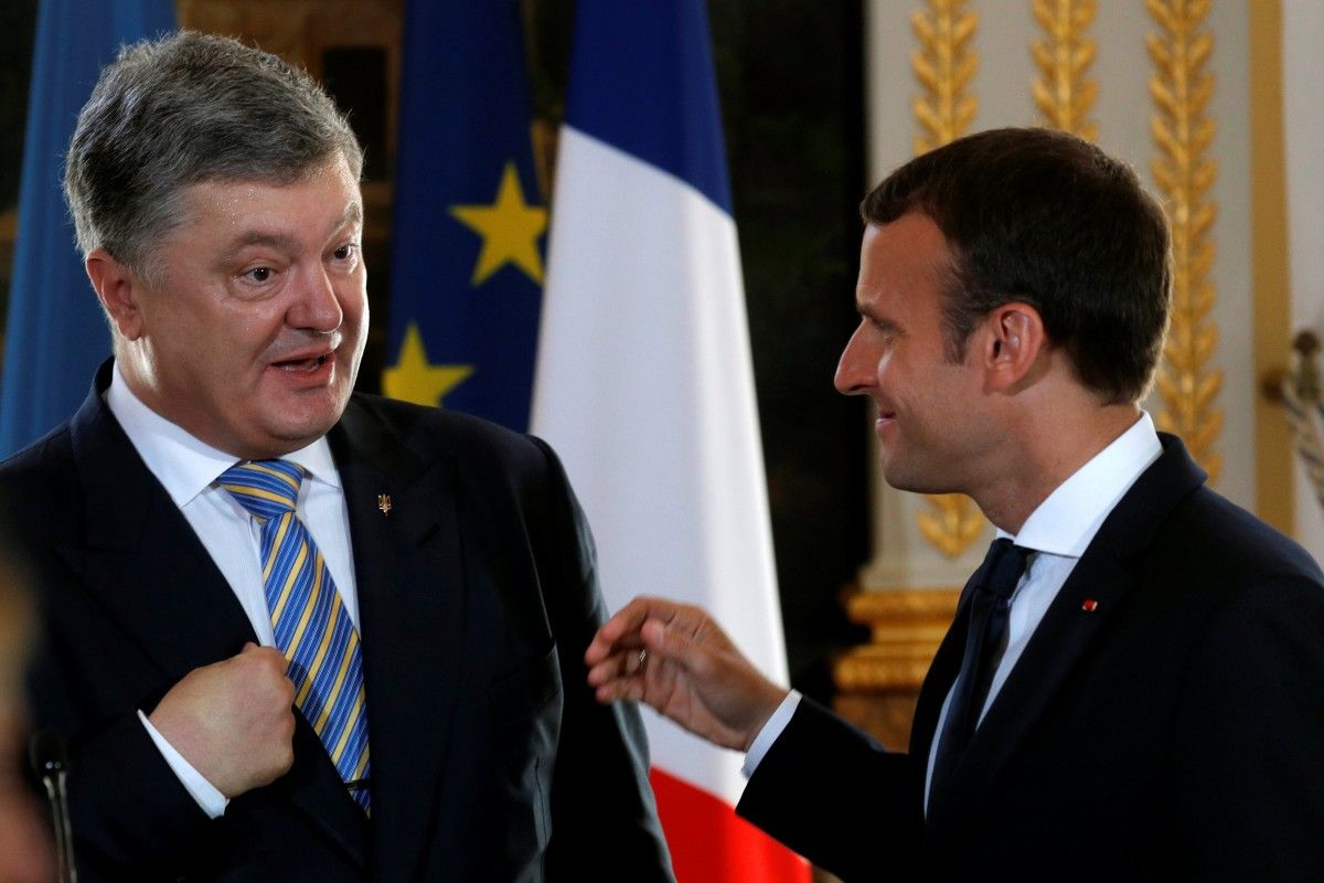 Петро Порошенко та Еммануель Макрон / REUTERS Петро Порошенко та Еммануель Макрон / REUTERS