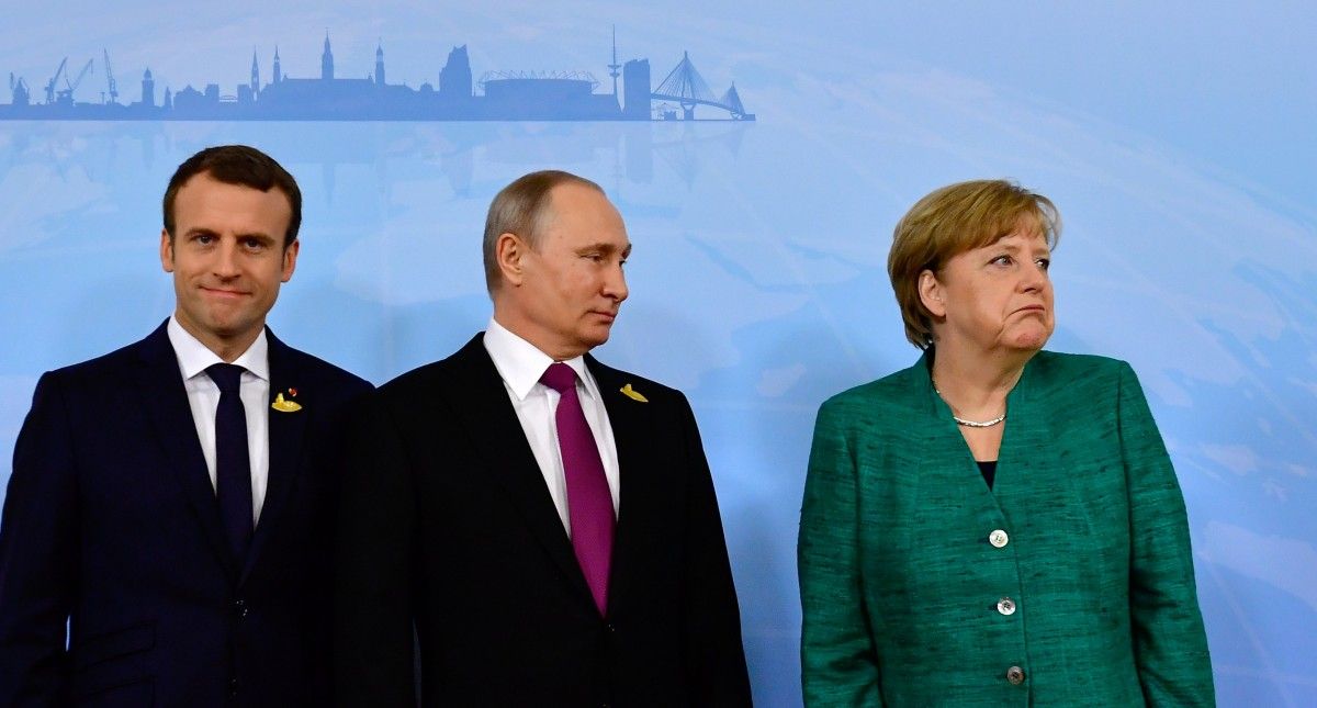 Встреча Макрона, Меркель и Путина по поводу ситуации в Донбассе / REUTERS Встреча Макрона, Меркель и Путина по поводу ситуации в Донбассе / REUTERS