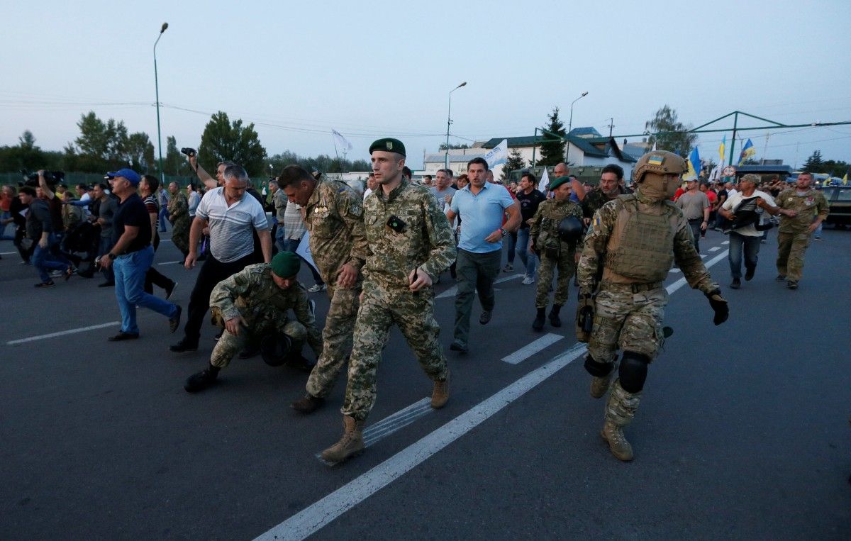 Прорыв границы / REUTERS