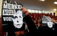 Меркель вдруге за тиждень закидали помідорами