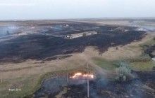 Масштабы пожара на складе боеприпасов под Мариуполем показали с высоты птичьего полета (видео)