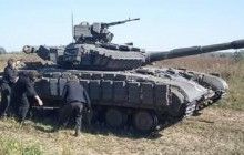 "Перехід в наступ" та водіння в складних умовах: українські танкісти провели навчання на Донбасі (фото)
