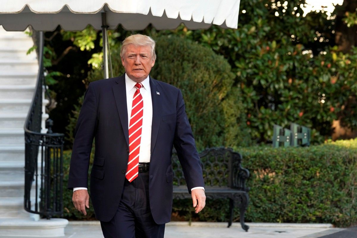 Дональд Трамп часто принимает непопулярные и скандальные решения / фото REUTERS Дональд Трамп часто принимает непопулярные и скандальные решения / фото REUTERS