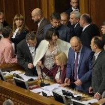 Ukraine's parliament fails to vote on Donbas reintegration bills due to blocked presidium, brawl