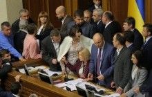 Ukraine's parliament fails to vote on Donbas reintegration bills due to blocked presidium, brawl