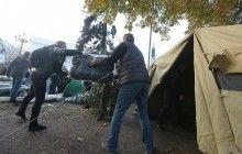 Protesters block traffic on Hrushevskoho Street in Kyiv by tents